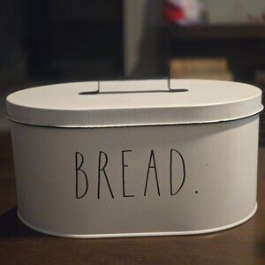 Rae Dunn white metal bread box with black handle removable lid and word BREAD